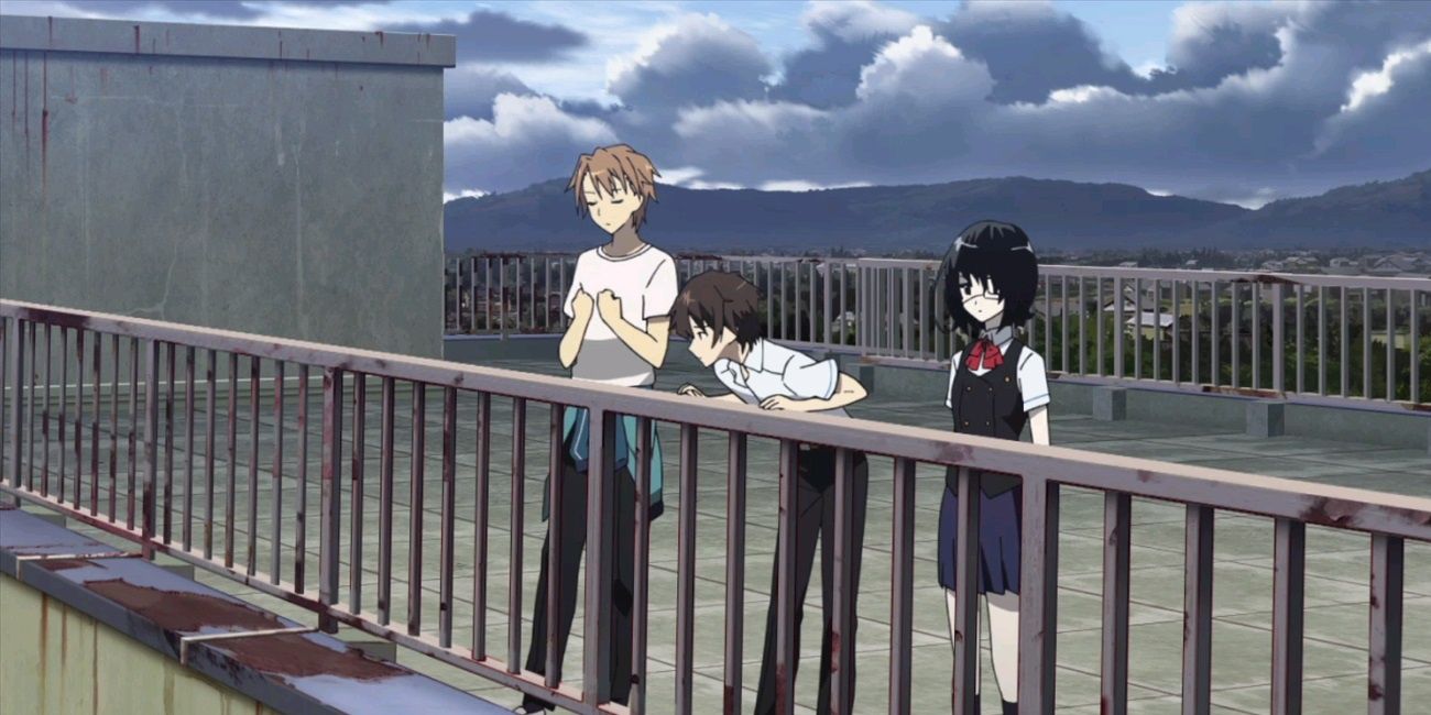 Kouichi with friends on the roof in Another