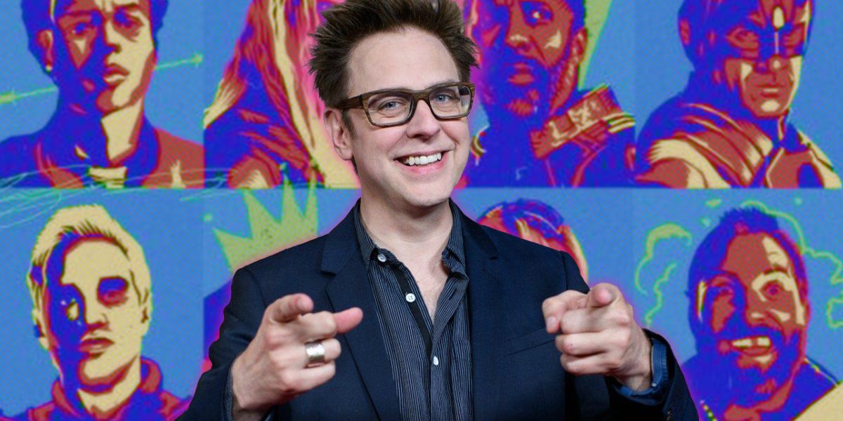 James Gunn in front of Suicide Squad poster