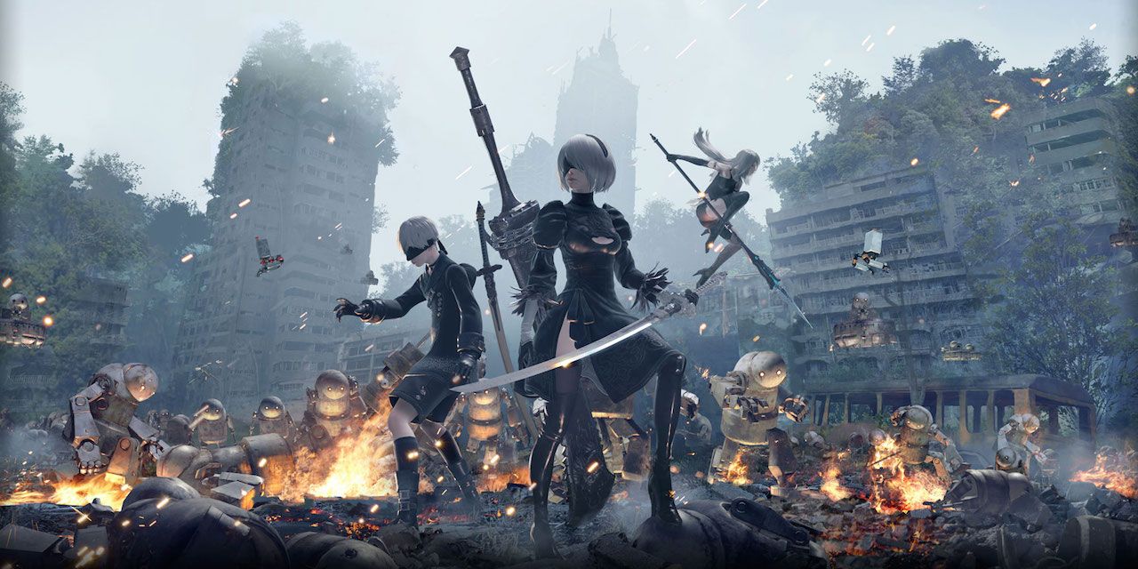 2B and 9S fighting machines in a ruined city in NieR: Automata game