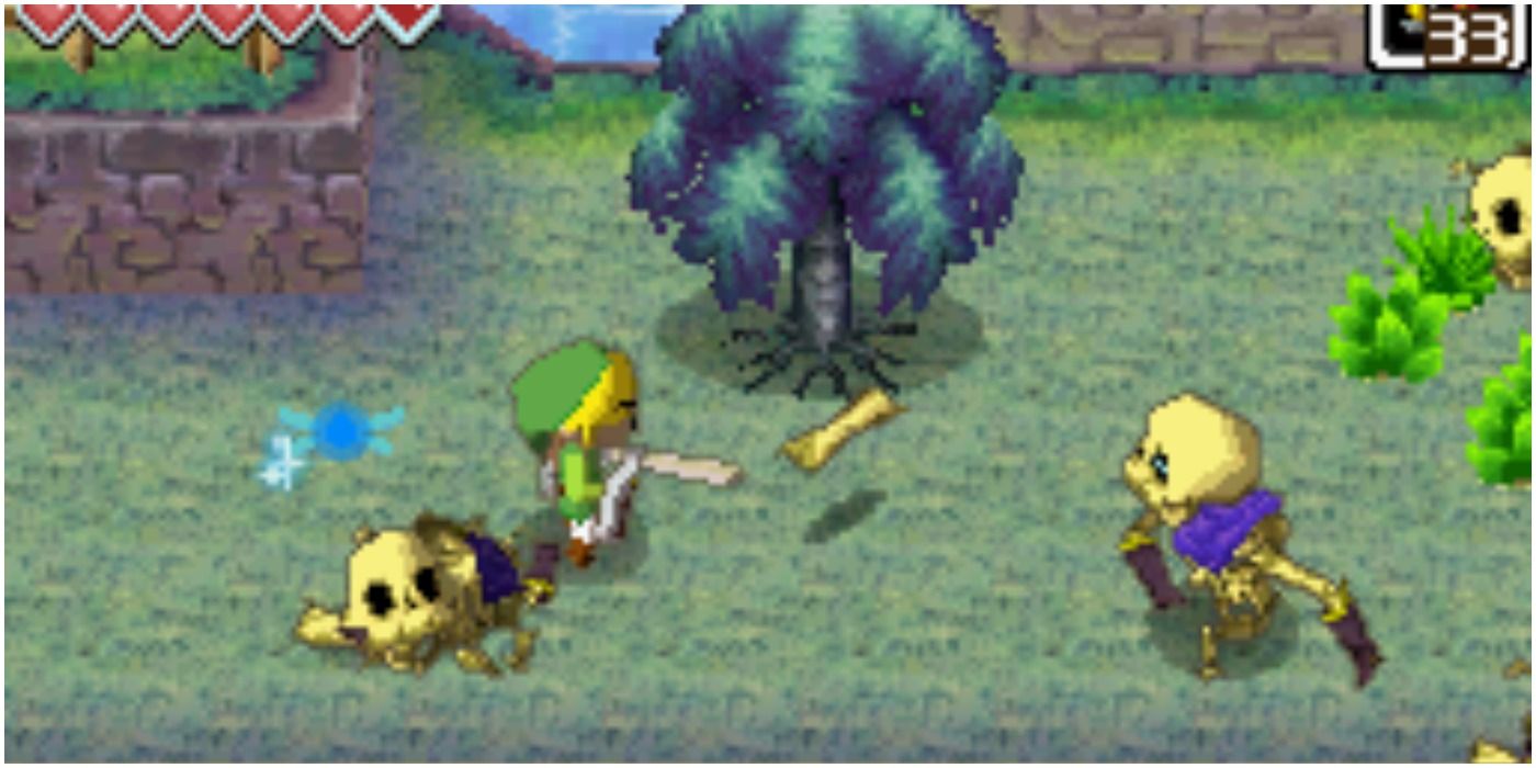 Link attacks skeletons in the Isle of the Dead in The Legend of Zelda: Phantom Hourglass