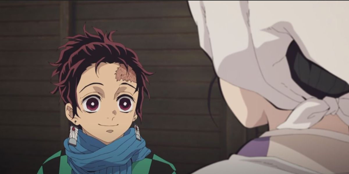 Tanjiro smiles at his mother in Demon Slayer Mugen Train
