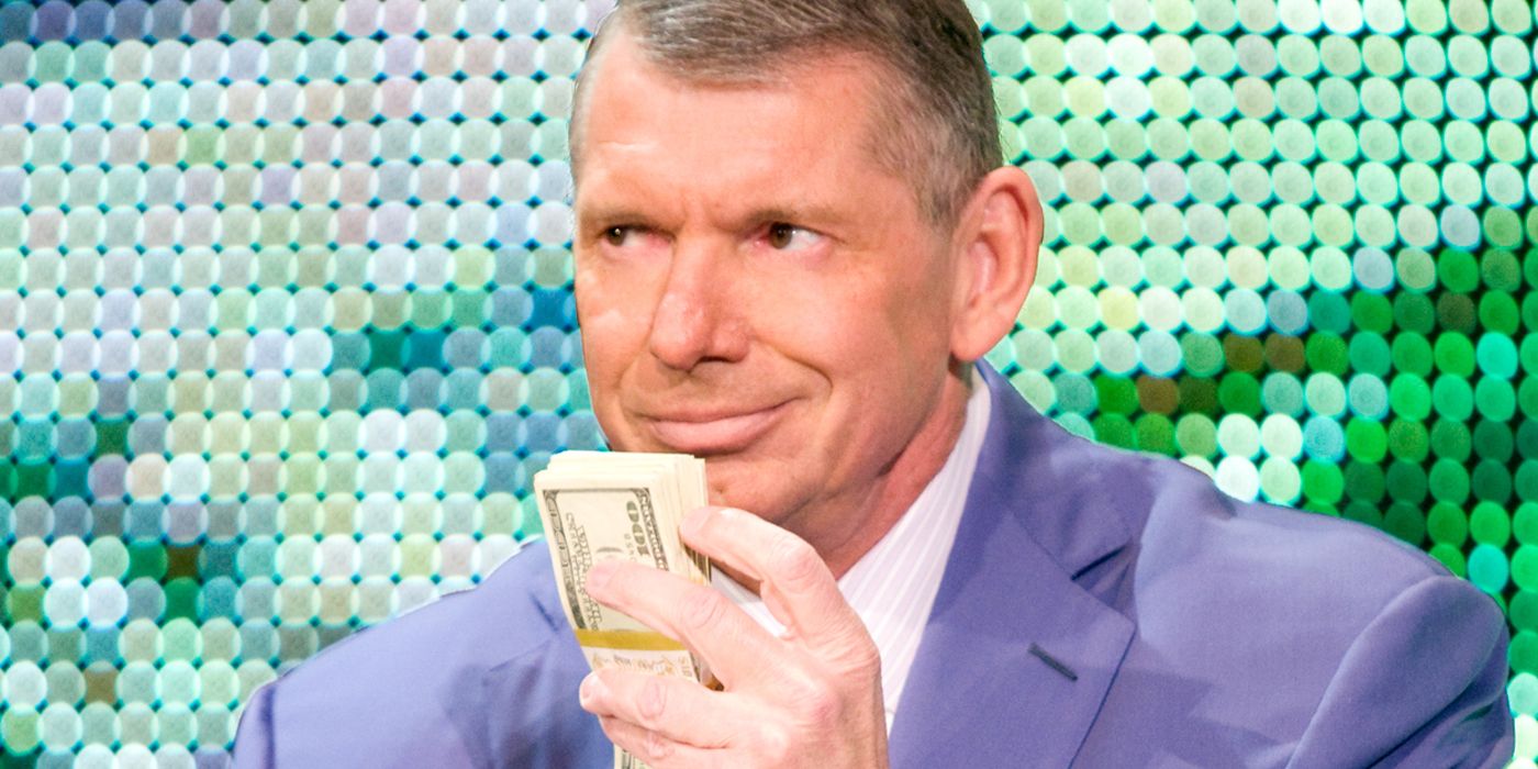 WWE CEO Vince McMahon sniffing money