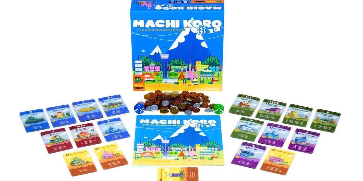 Display of Machi Koro game box and components.