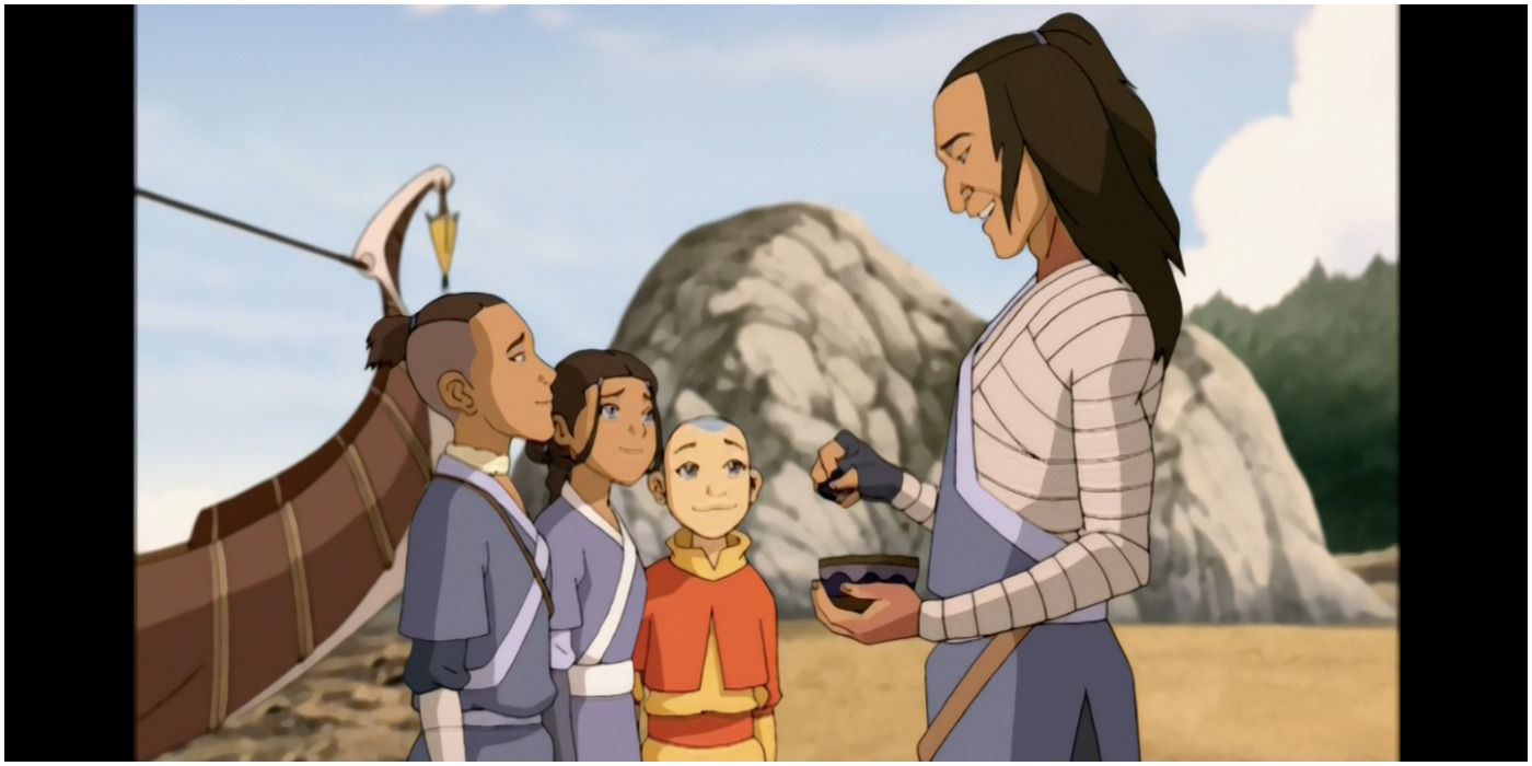 Bato paints ceremonia symbols on Sokka and Katara 