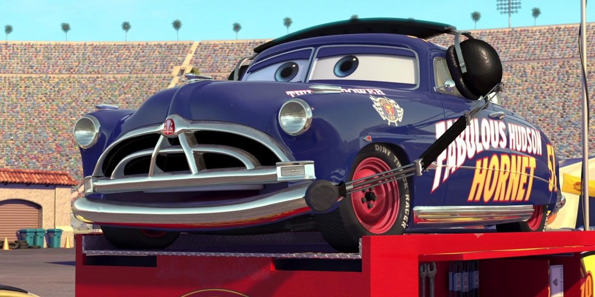 Doc Hudson gives McQueen directions in the racing pit