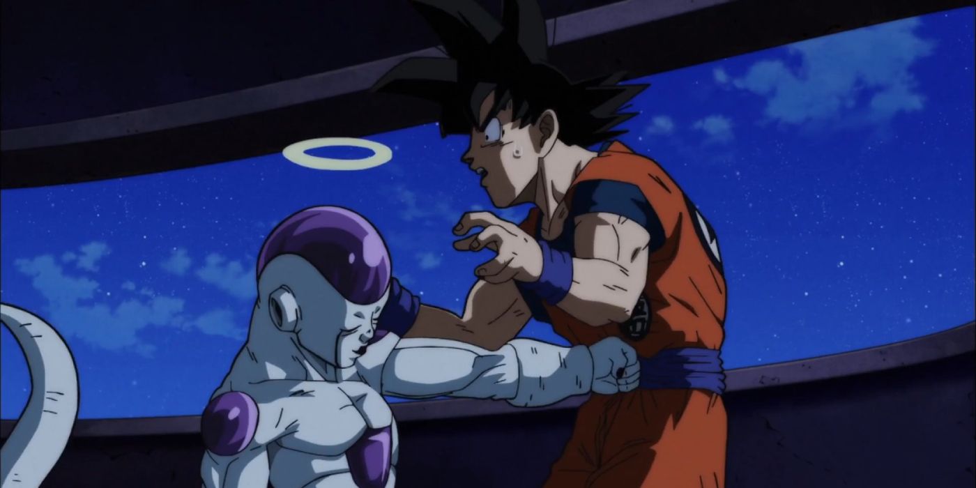 Frieza punches Goku in Dragon Ball Super.