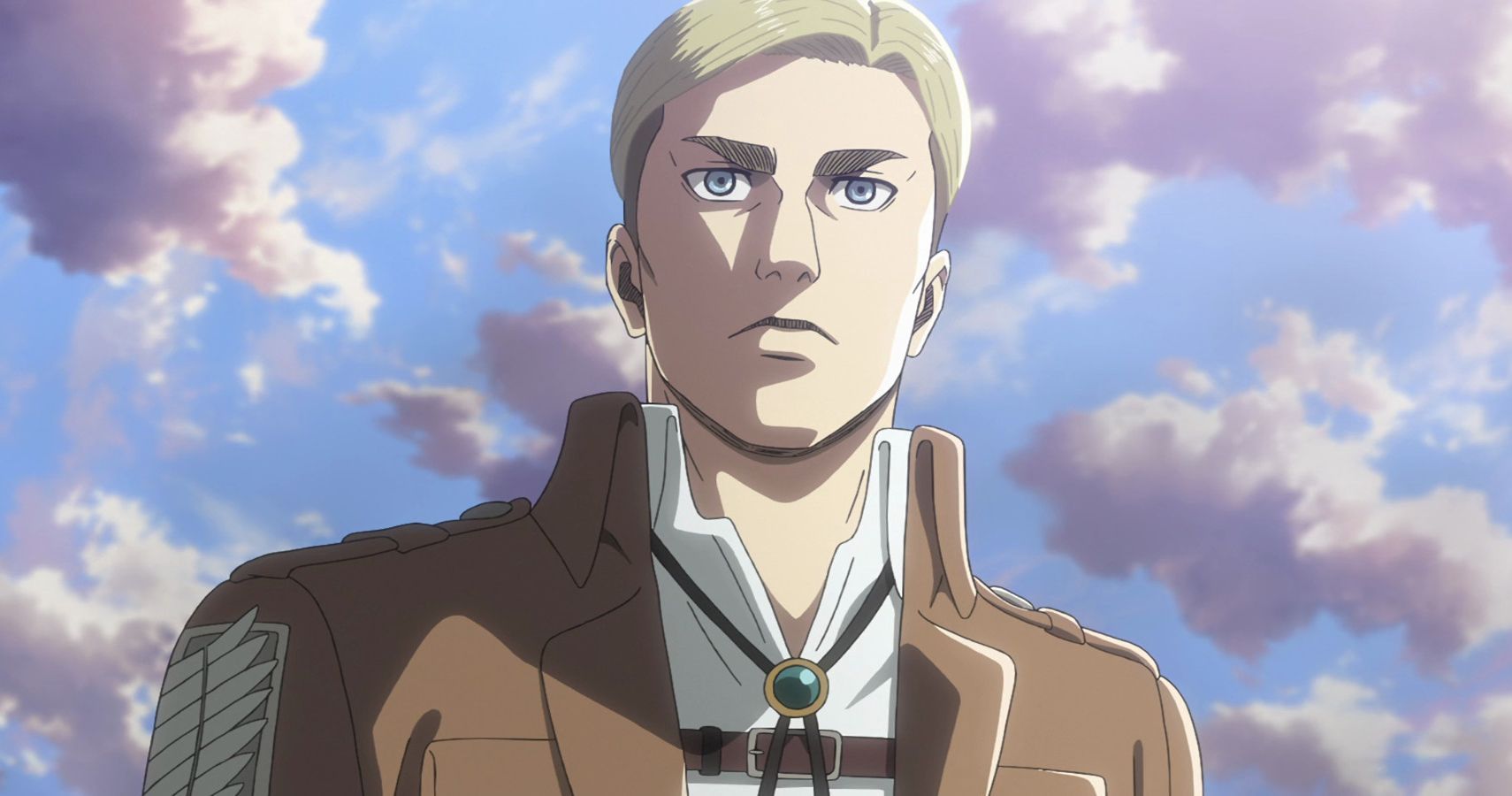 Erwin Smith looking into the middle distance with a clouded blue sky in the background- Attack on Titan