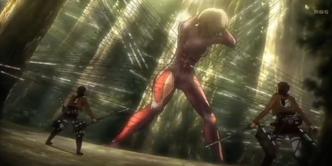 Scouts trap the Female Titan with wires in the forest