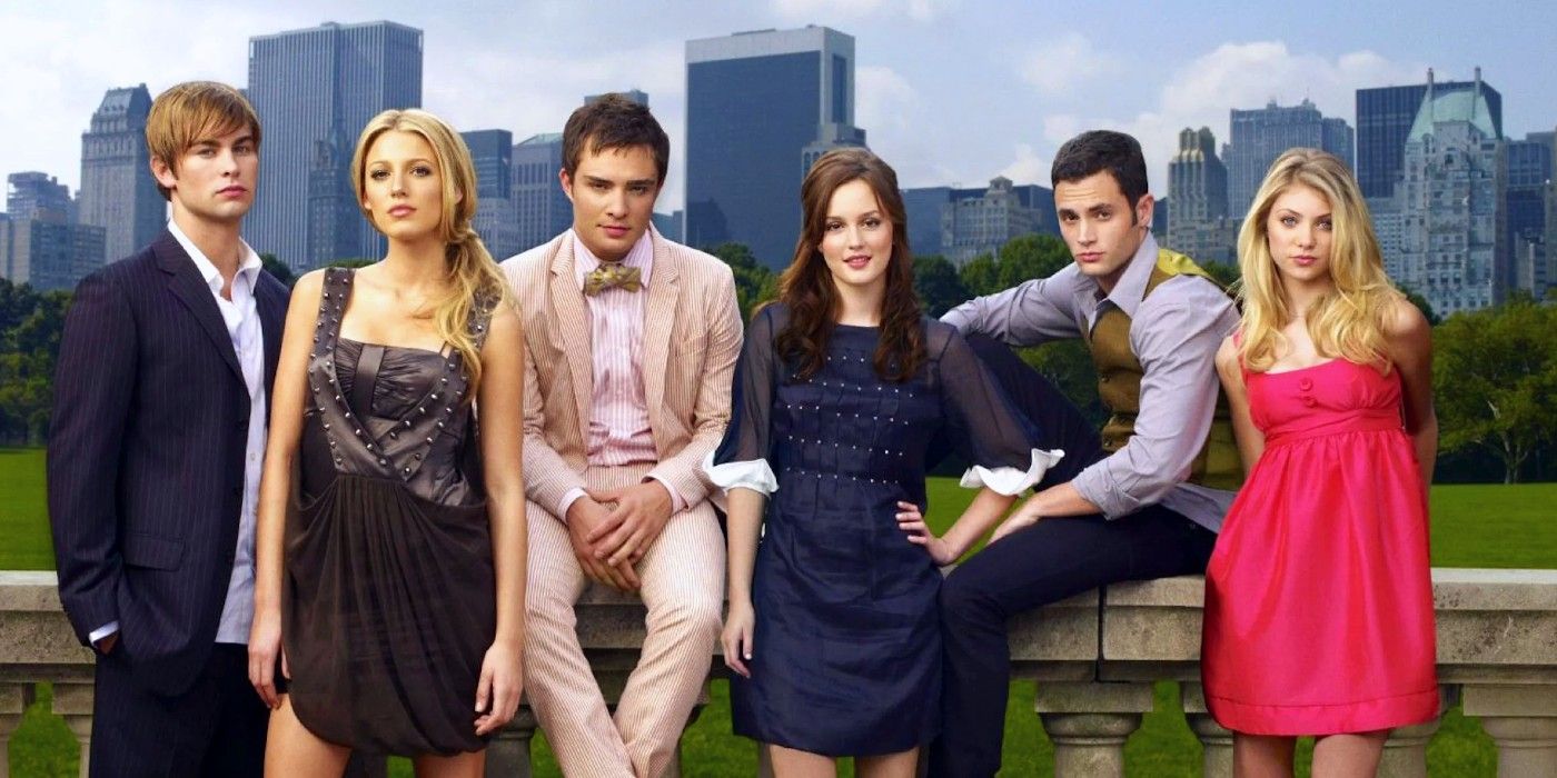 The cast of Gossip Girl poses before the New York skyline in Gossip Girl.