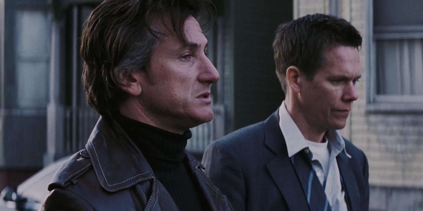 Sean Penn and Kevin Bacon looking upset in Mystic River.