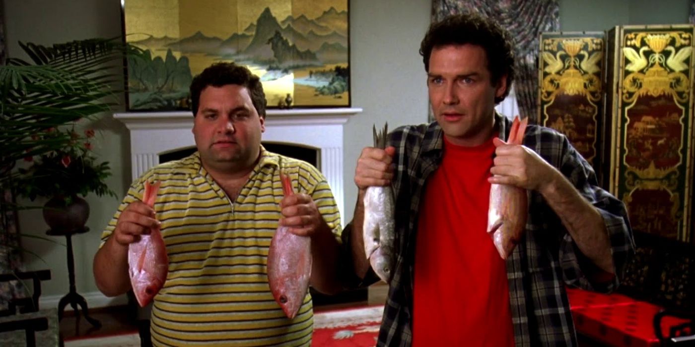 Norm MacDonald and Artie Lange holding fish in Dirty Work