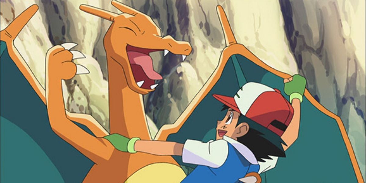Ash and Charizard celebrating in Pokémon.