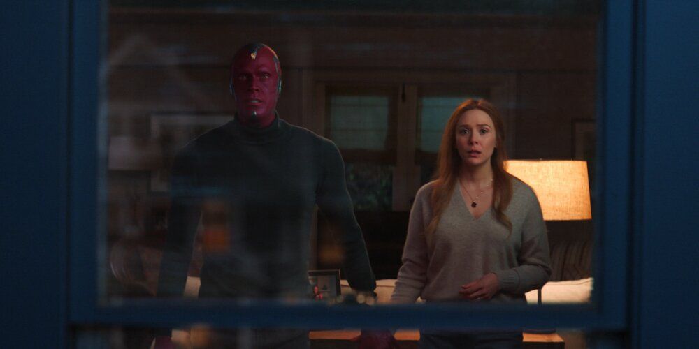 Wanda and Vision hold hands as the Hex disappears in Wandavision