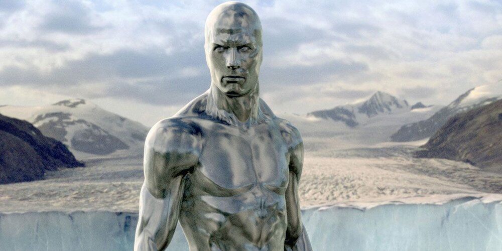 The Silver Surfer stands in front of a lake in Rise of the Silver Surfer movie