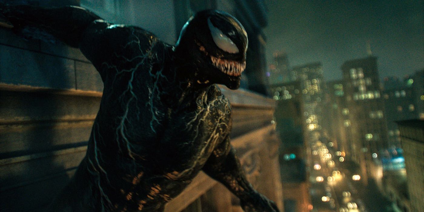 Venom hanging off a rooftop in Venom: Let There Be Carnage