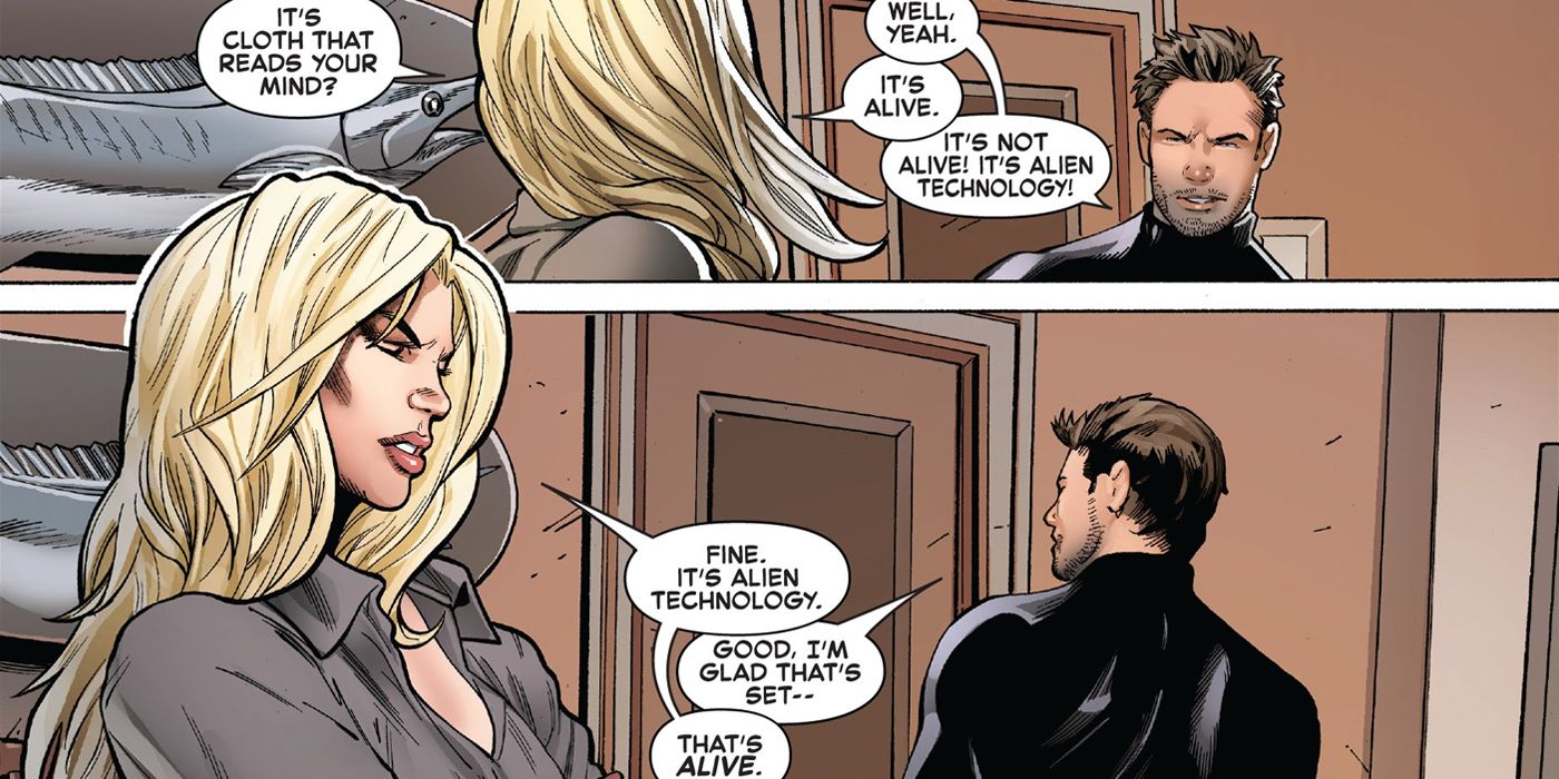 Black Cat pointing out to Peter Parker that his new alien costume is alive