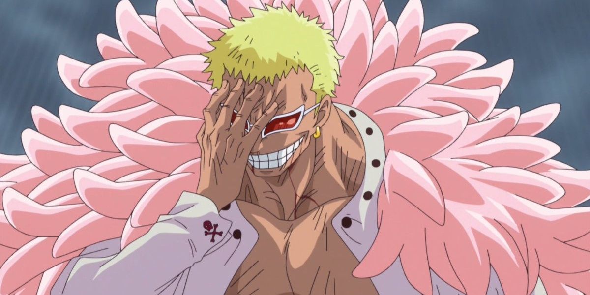 Doflamingo From One Piece Smiling And Holding Hand To Face