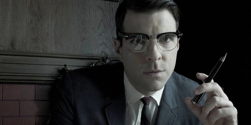 Dr. Oliver Thredson speaking with Kit about the Bloody Face killings in American Horror Story