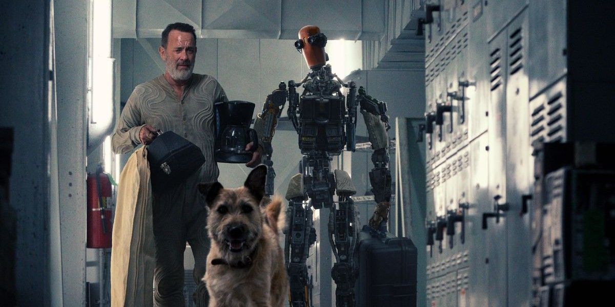 Tom Hanks and a robot walk down a hallway with a dog