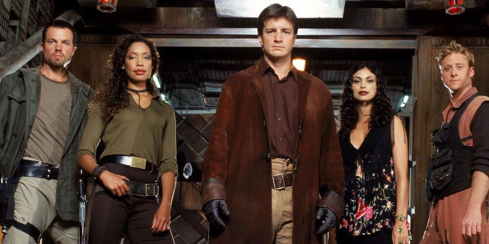 The crew of Serenity, including Jayne, Zoe, Mal, Kaylee and Wash from Firefly