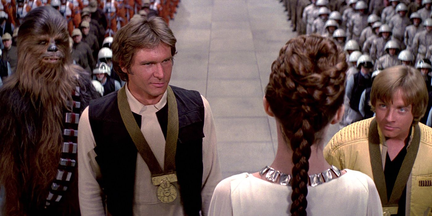 Princess Leia gives Han Solo and Luke Skywalker medals at the end of A New Hope