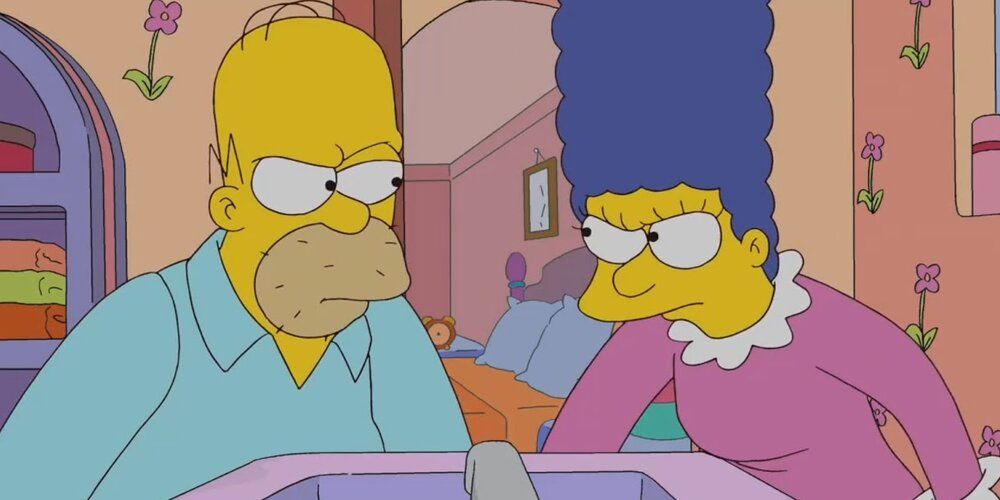 Homer and Marge angrily glare at one another in the Simpsons
