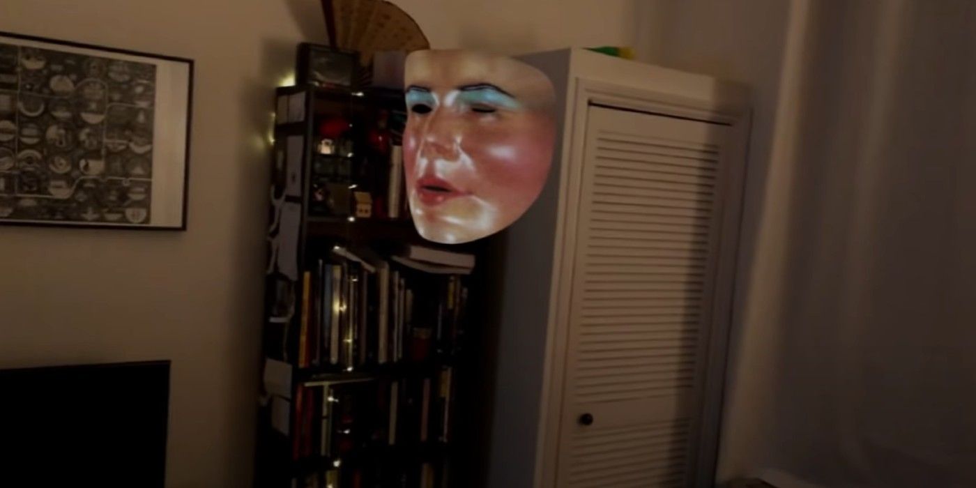 A mask floats on a Zoom screen in Host available on Shudder