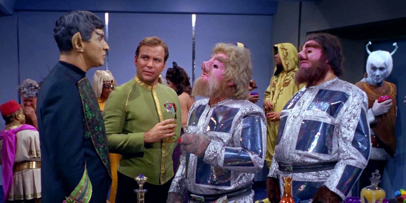 Kirk and Sarek mingle with alien guests in Star Trek's Journey to Babel