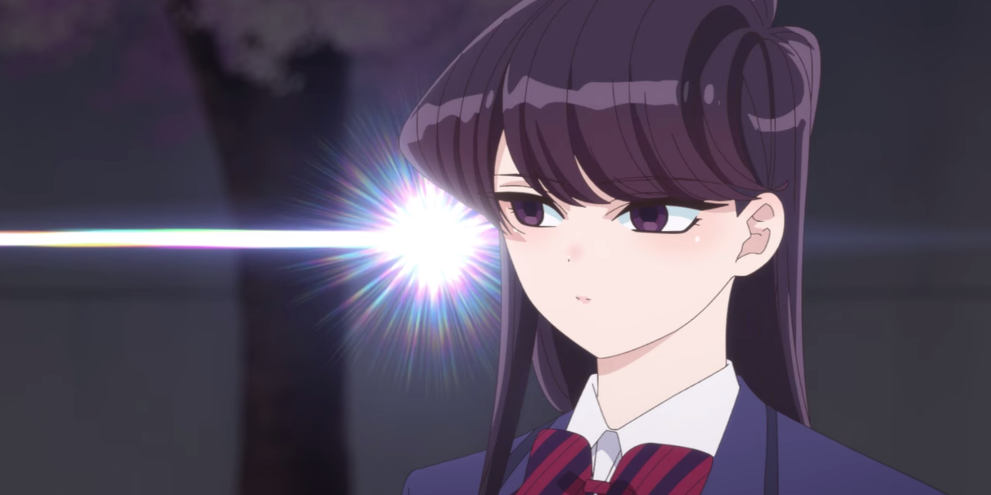 Komi looks on with a beam of light to signify intensity in Komi Can't Communicate