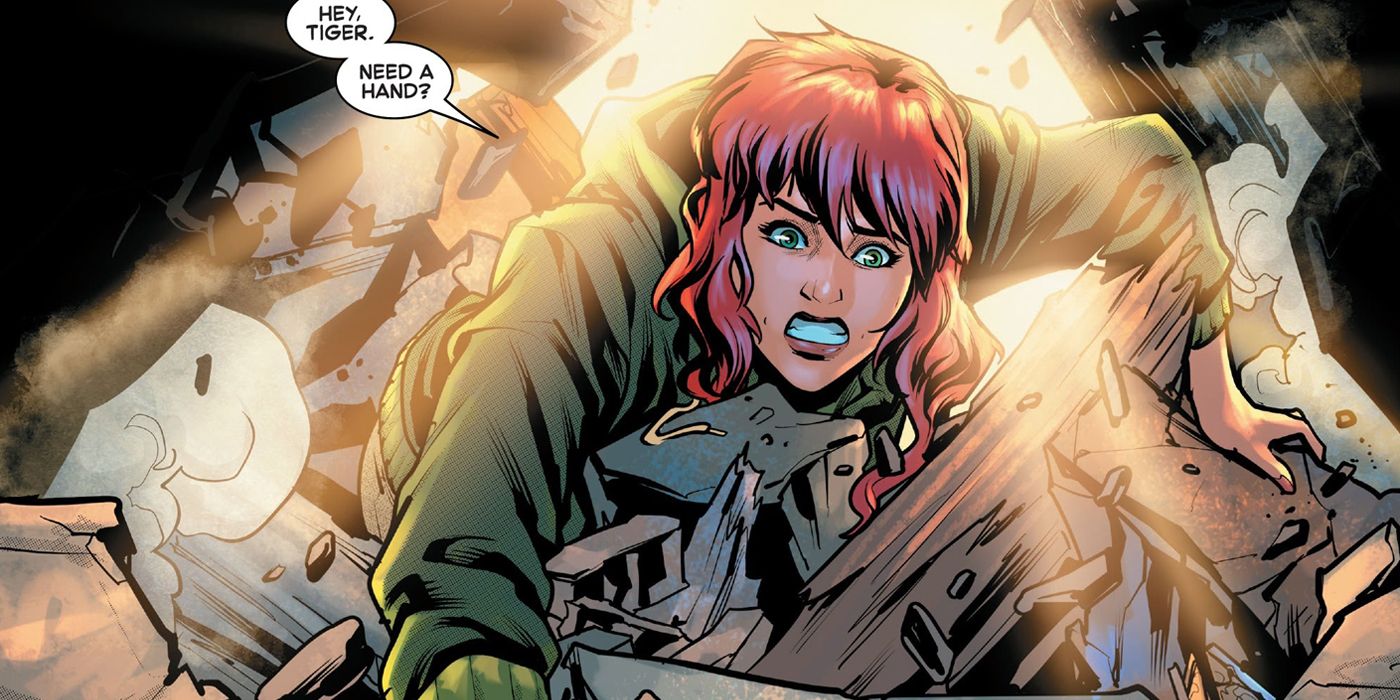 Mary Jane digging Spider-Man out from under a fallen building