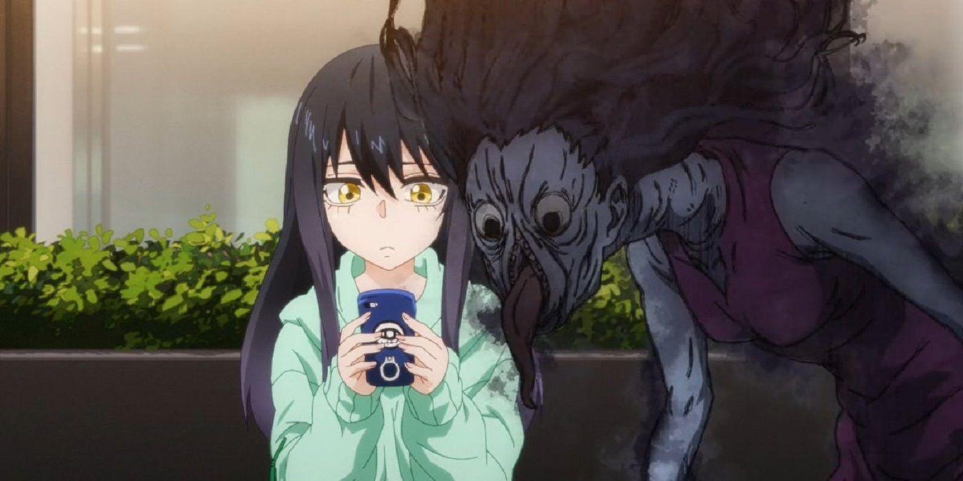 The main character of Mieruko-chan, Miko, is staring blankly at her phone while a grotesque-looking ghost peers over her shoulder.