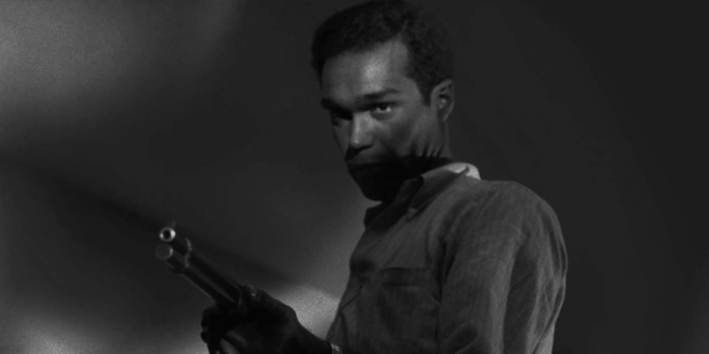 Ben holding a gun from Night of the Living Dead