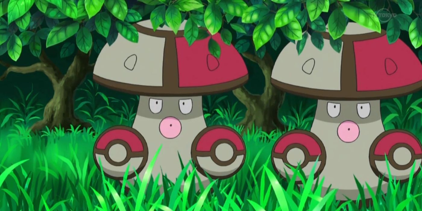 Two Amoonguss under a bush in the Pokémon anime.