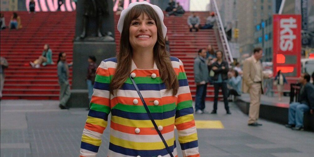 Rachel Berry in New York smiling and looking up in Glee.