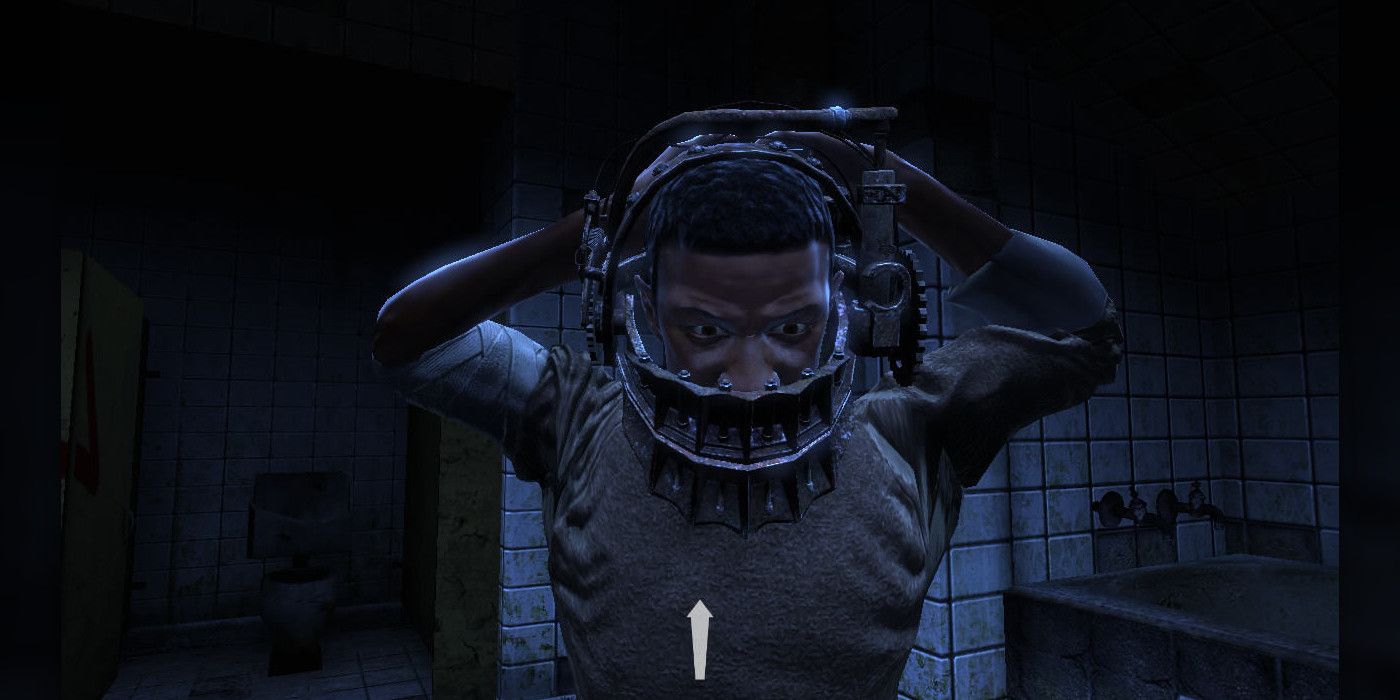 David Tapp trying to escape the reverse bear trap in the Saw video game.
