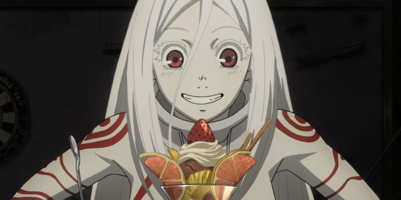 Shiro eating sweets in Deadman Wonderland.