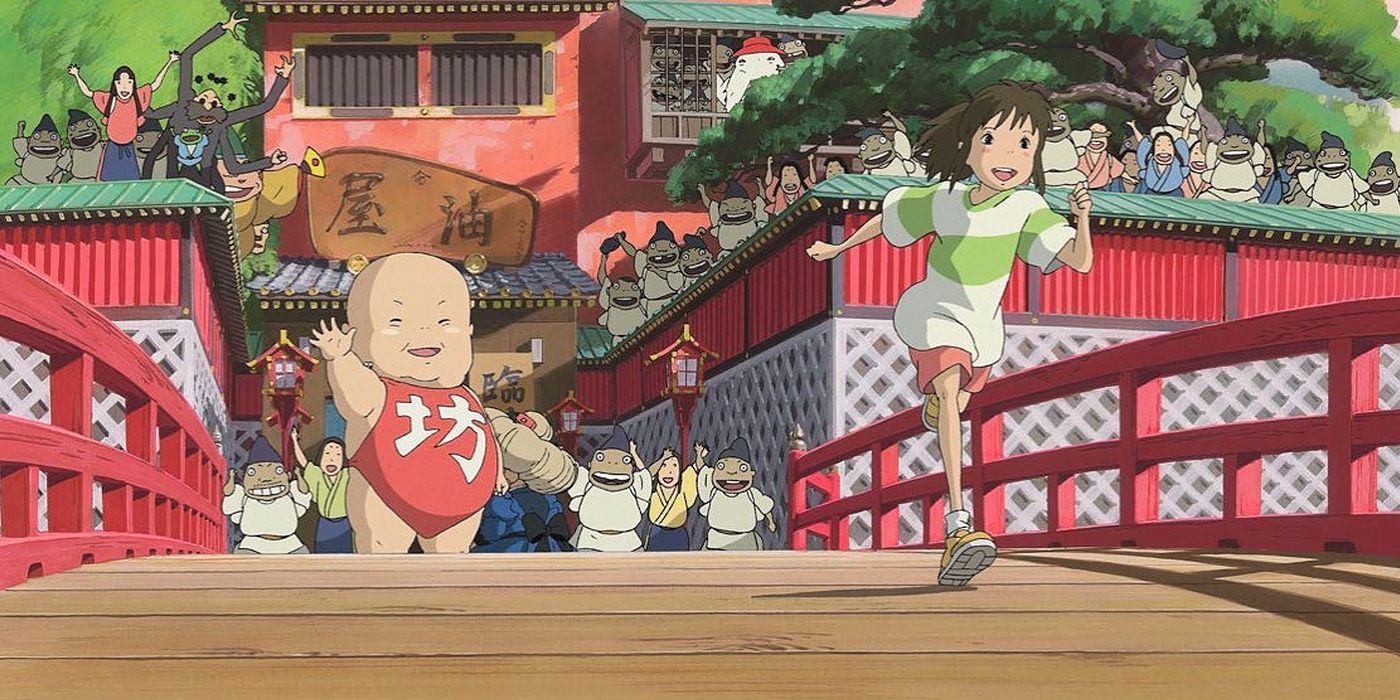 Chihiro runs from the bathhouse, chased by demons in Spirited Away.
