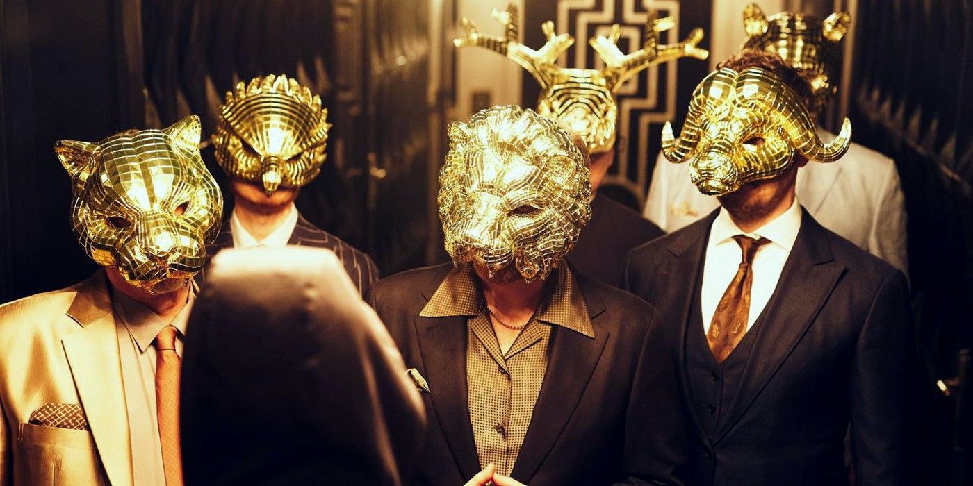 VIPs wearing golden animal masks from Squid Game
