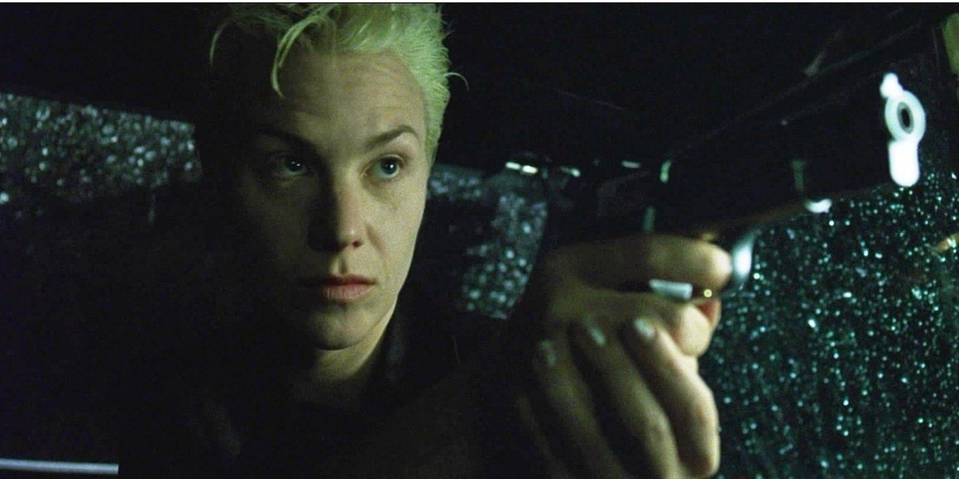 The Matrix. Switch points a gun at Neo