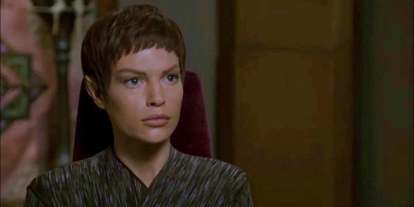 T'Pol with a straight face looking ahead in Star Trek.