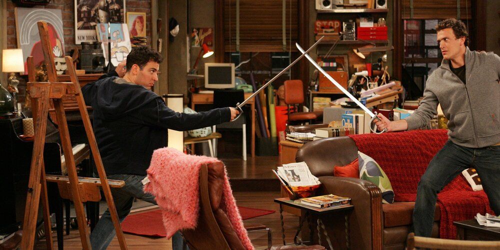 Ted and Marshall duel one another with swords in How I Met Your Mother