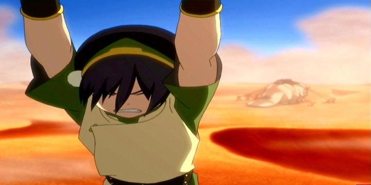 Toph holding up the library while appa gets dragged away