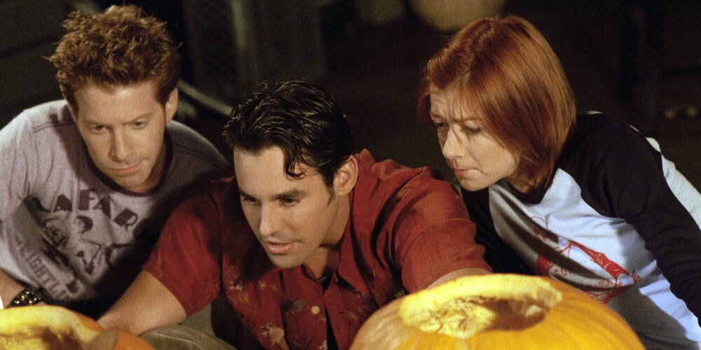 Xander, Willow and Oz look at some pumpkins in Buffy