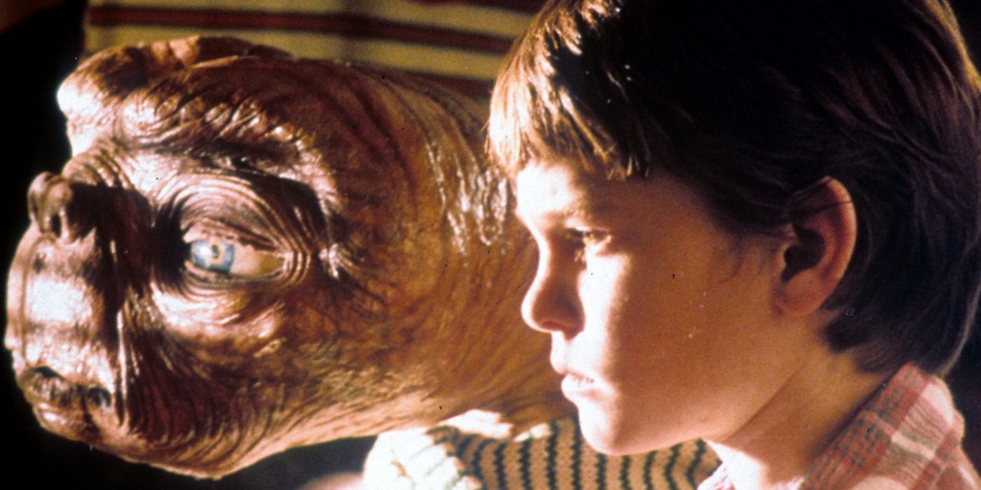 E.T. and Elliott by the window in E.T, the Extra-Terrestrial