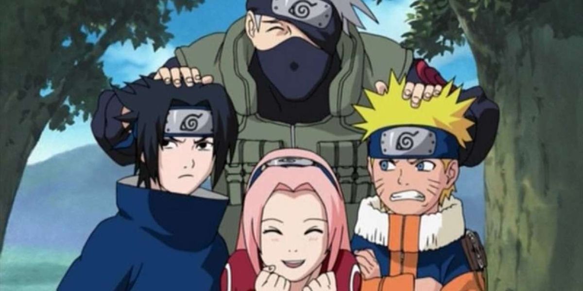 Team 7 Poses For A Photo