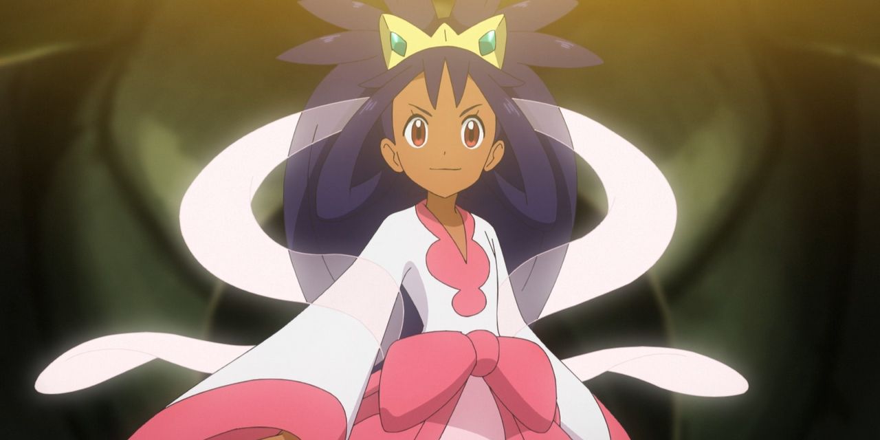 Iris from Pokémon seen in the anime wearing her Champion outfit from B2W2.