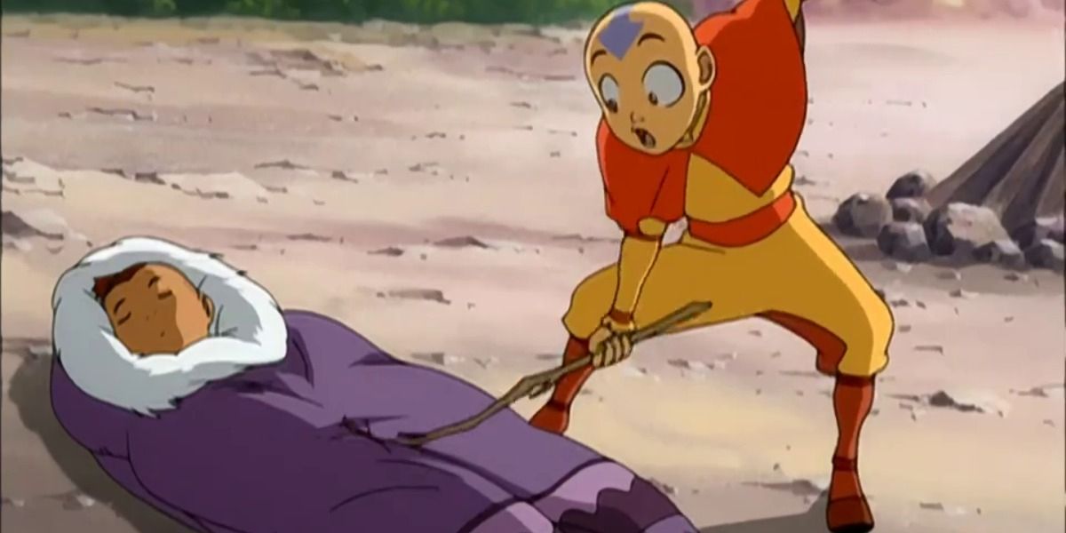 Aang running a stick along Sokka's sleeping bag