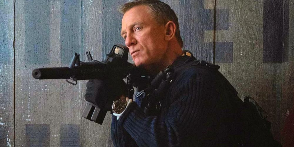 James Bond shouldering a rifle in Spectre