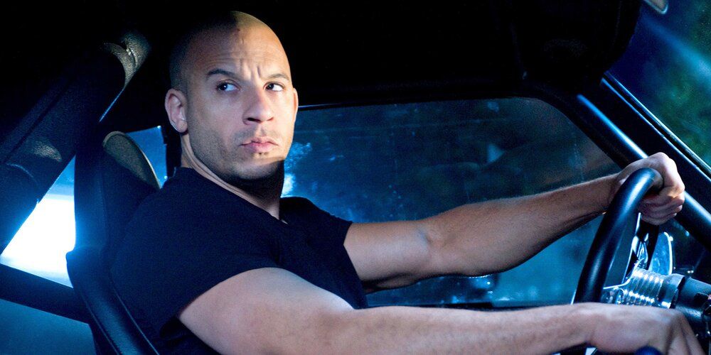 Dominic Toretto at the wheel of a car in Fast and Furious