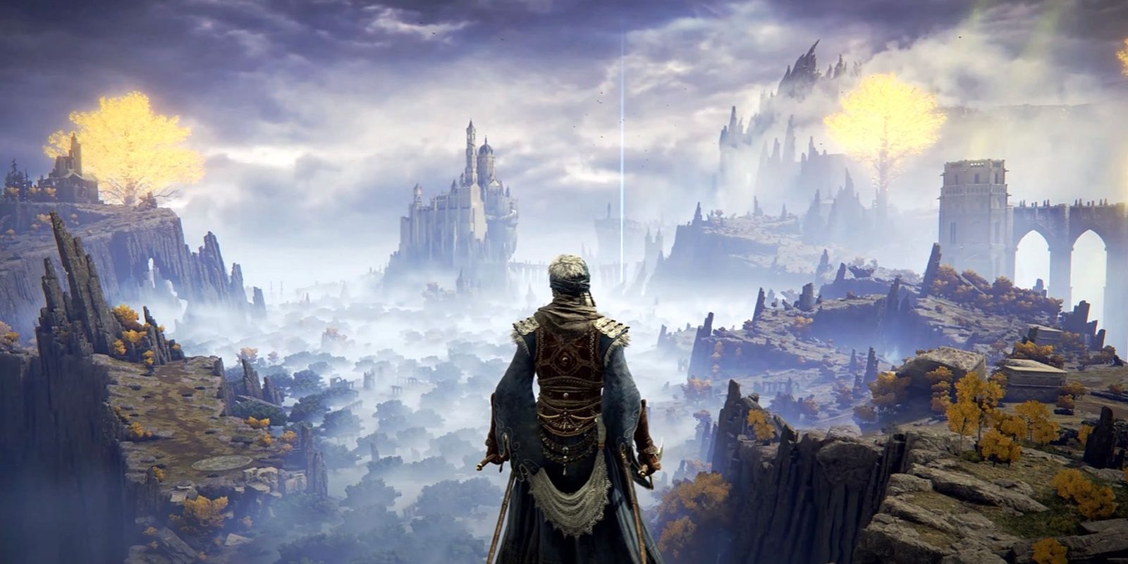Elden Ring key art showing a man looking at a wide open world. Article: Best spears